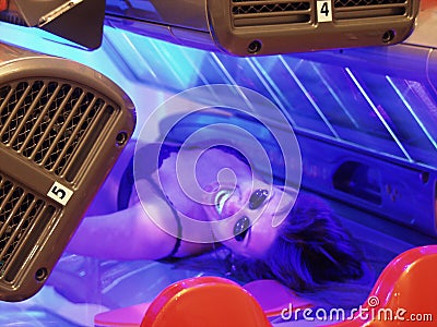 Beauty in tanning bed