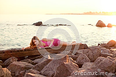 Beauty woman on the beach at sunset. Enjoy nature. Luxury girl r