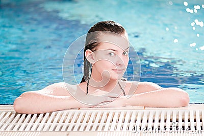 Beauty woman in swimming pool