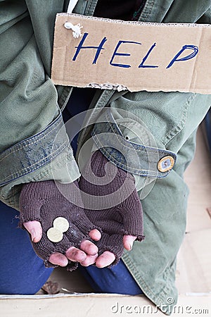 Beggar hands asking for a help