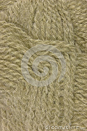 Beige fine wool threads texture clew macro closeup