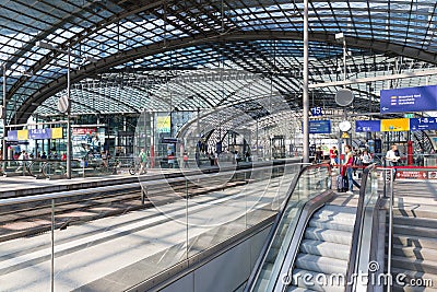 BERLIN, GERMANY - JULY 25: Tourists and workers are waiting for the train at the central station of Berlin on July 25, 2013 in the