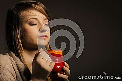 Beverage. Girl holding cup mug of hot drink tea or coffee