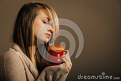 Beverage. Girl holding cup mug of hot drink tea or coffee