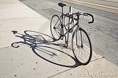 Bicycle locked up on the street in Toronto