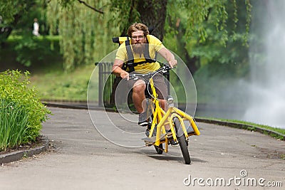 Bicycle messenger with cargo bike speeding