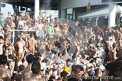 Big crowd of swimmers, hot summer day on Zrce beach