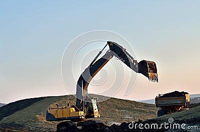 Big excavator load the truck