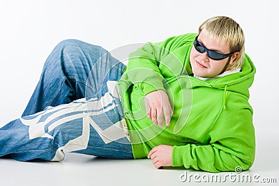Big guy in a green shirt and jeans