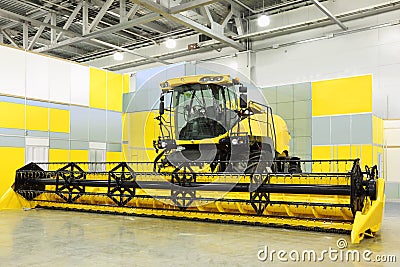 Big harvester are in room at exhibition