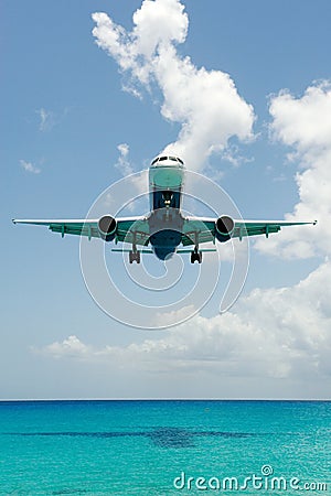 Big plane landing over water