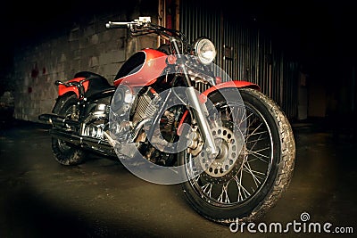 Motorcycle in dark garage