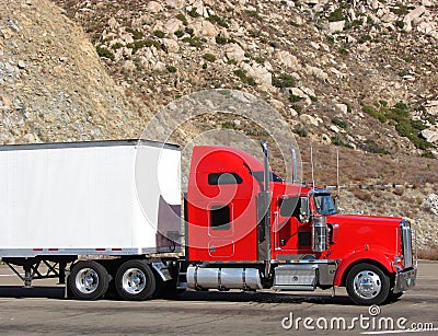 Big Rig Tractor Trailer Truck on a Mountain Road
