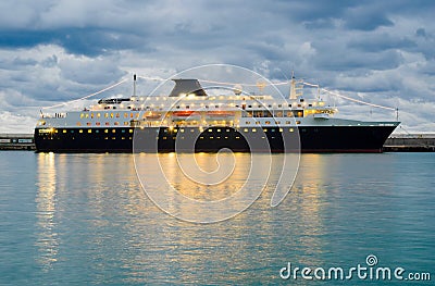 Big ship at night pier