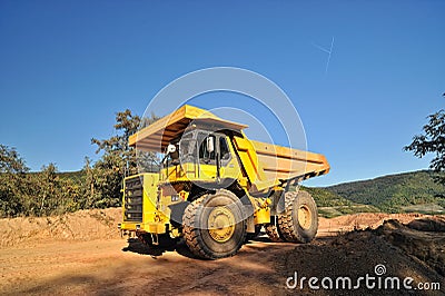 Big yellow tipper truck