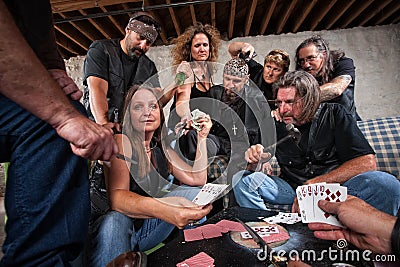 Biker Gang Lady Shows Winning Hand