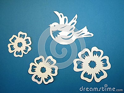 Bird and flowers. Paper cutting.