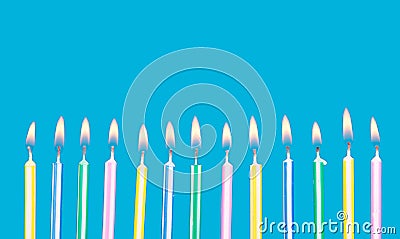 Birthday candles in a row with flames