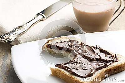 Bitten White Bread with Nutella and Milk