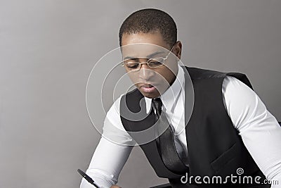 Black Business man writing a document