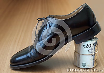 Black business shoe with money