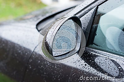 Black car wing mirror