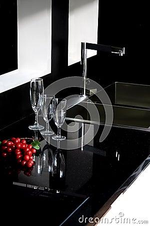 Black granite top with shiny glasses