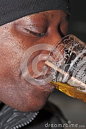Black guy drinking beer