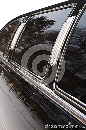 Black limousine car with mirror glass.