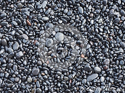 Black rock pebbles mineral stones background