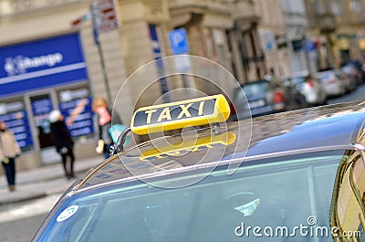 Black taxi car in city of Prague