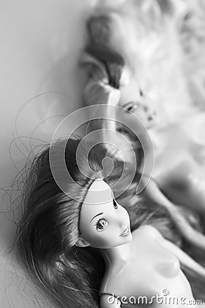 Black and white composition with Barbie dolls