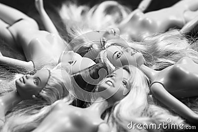 Black and white composition with Barbie dolls