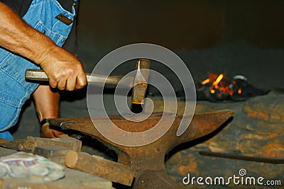 Blacksmith at forge