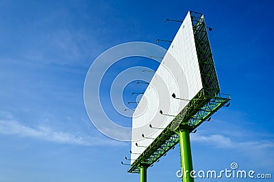 Blank advertising billboard in blue sky