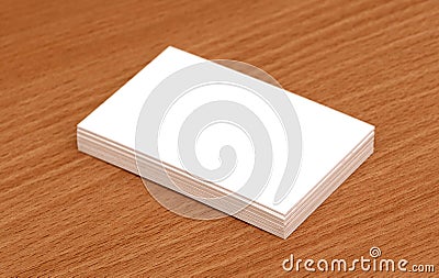 Blank business cards stacked up on a desk