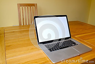 Blank laptop on table