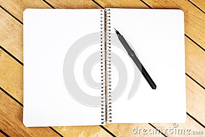 Blank notepad with black pen