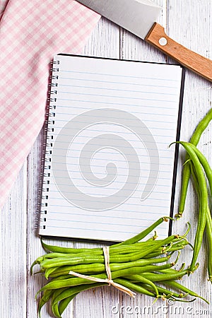 Blank recipe book with green beans