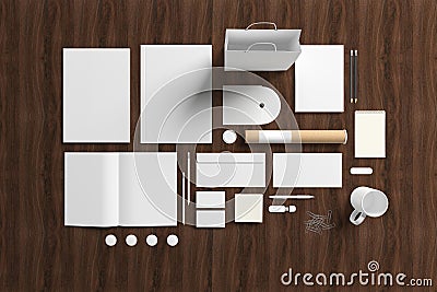 Blank stationery set on wooden background