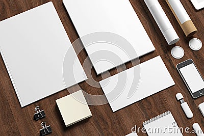 Blank stationery on wooden background