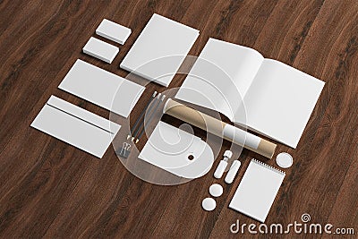 Blank stationery on wooden background