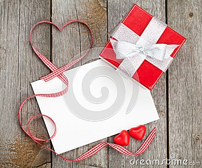 Blank valentines greeting card and small red gift box