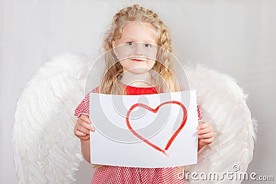 The blond girl with wings of an angel in a Valentine s Day card