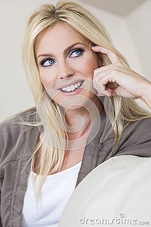 Blond Woman With Blue Eyes Smiling