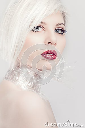 Blonde model girl in plastic