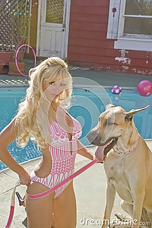 Blonde Woman Poolside with a Great Dane