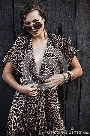Blonde woman wearing leopard-skin dress