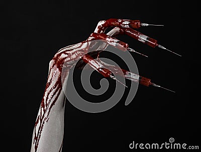 Bloody hand with syringe on the fingers, toes syringes, hand syringes, horrible bloody hand, halloween theme, zombie doctor, black