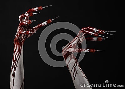Bloody hand with syringe on the fingers, toes syringes, hand syringes, horrible bloody hand, halloween theme, zombie doctor, black